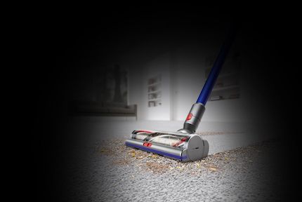 Dyson V11 Absolute vacuum side view cleaning carpet